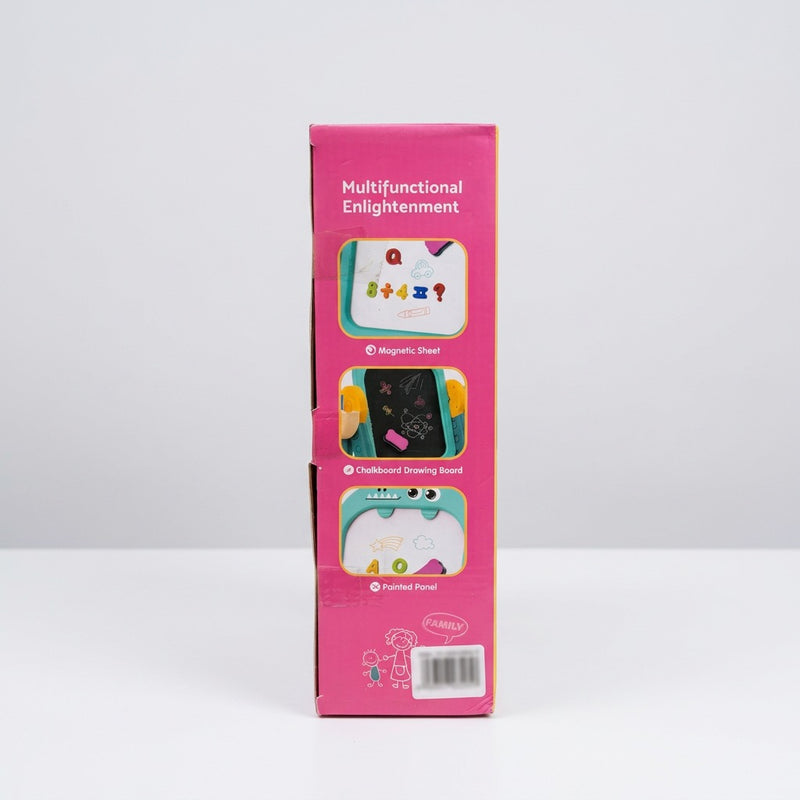 Drawing Easel box front, teal dinosaur colourway, with the "Includes" parts list and the 3+ age badge
