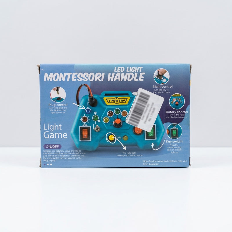 Close-up of the box back controls with the shop price sticker reading Educational Game-028, Rs. 1,715.00
