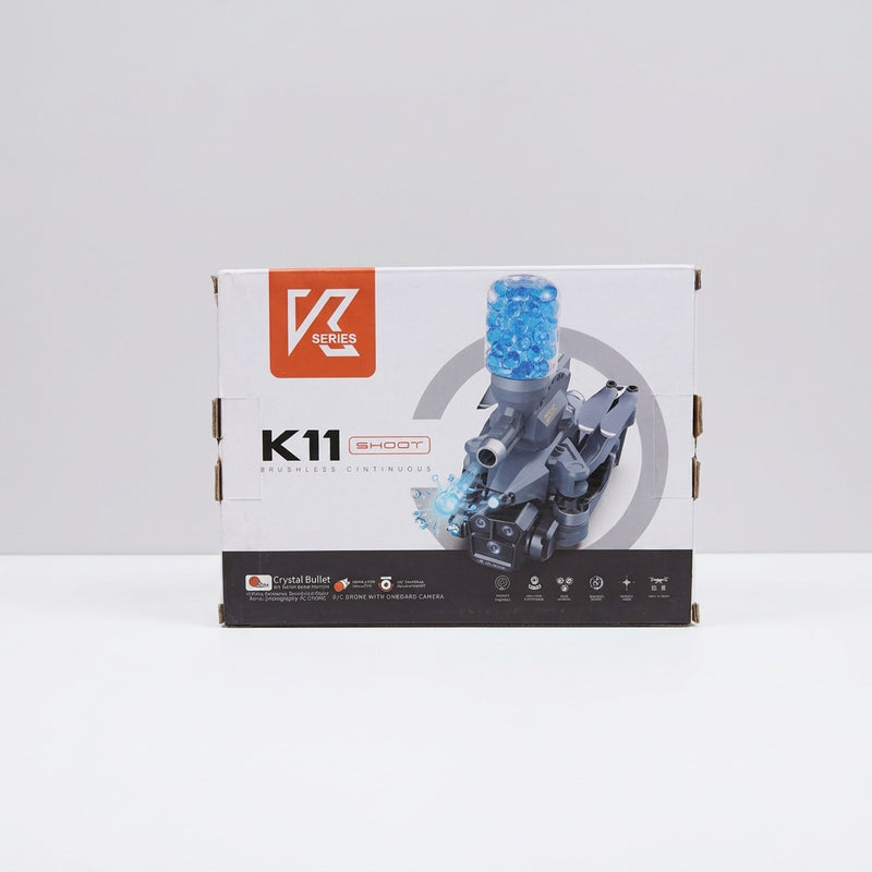 Close-up of the box top corner with the shop price sticker reading DRONE-K11, Rs. 12,760.00