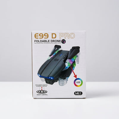 E99 D Pro foldable drone box front, folded black drone with rainbow LED arm lighting and the 14+ badge