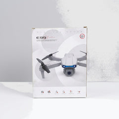 Close-up of the shop price sticker reading Drone With Cmera (U1) Rs. 10,875.00, next to the red remote control