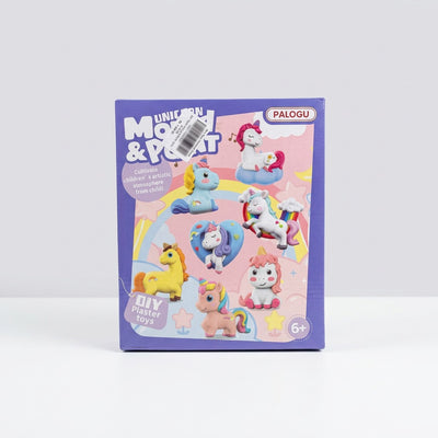 Close-up of the box front showing two finished unicorn figures and the shop price sticker