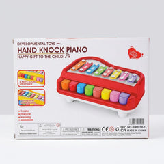 Back of the box showing the 8 keys and 8 scale panels and the two beaters