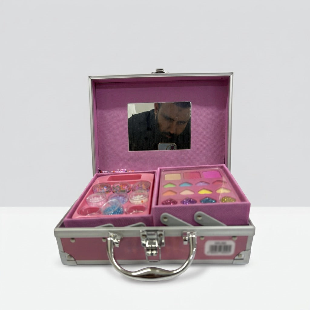 Open case showing the fold-out mirror above a tray of glitter pots