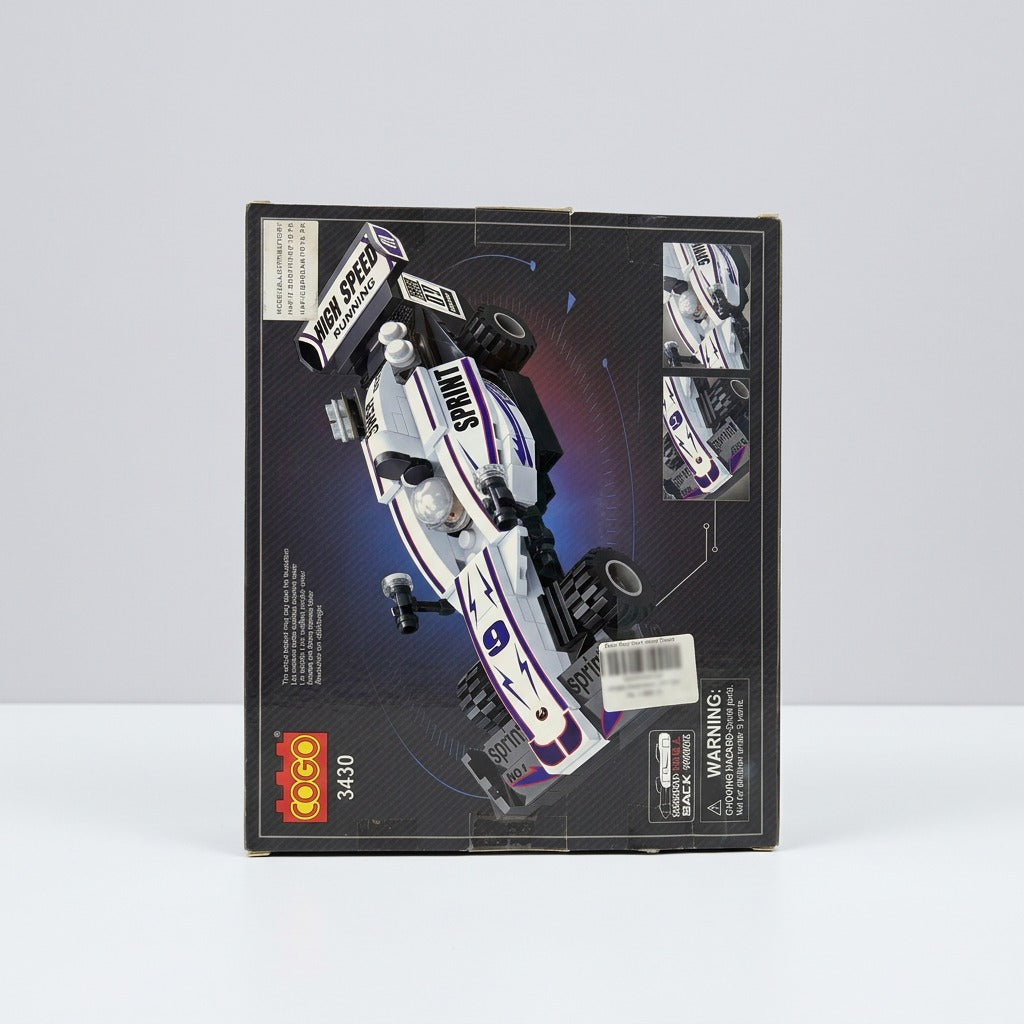 White and purple building-block race car box, back panel showing the same model and the choking-hazard warning